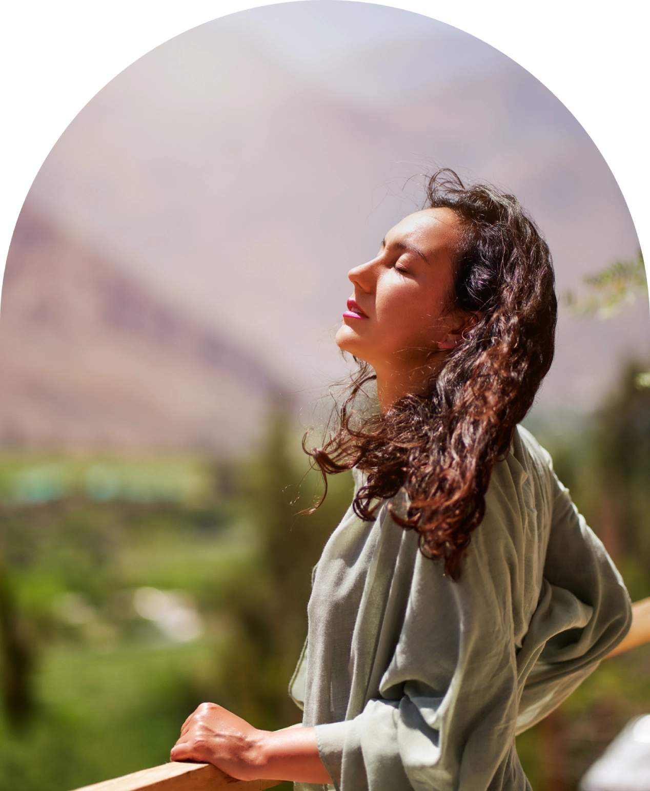 Woman enjoying sunlight in natural setting. Woman enjoying sunlight in natural setting.
